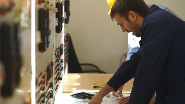 Engineering team reviewing project plans